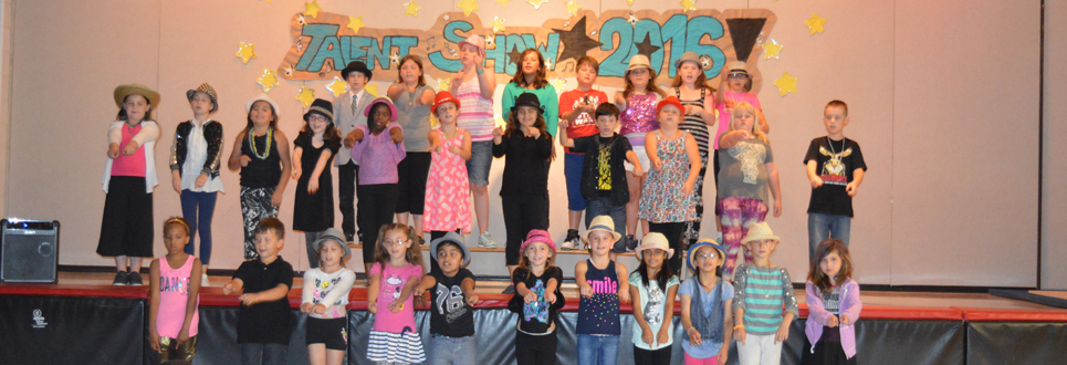 A group of students performing in the St. John XXIII Catholic School talent show